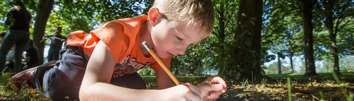 Ulster Wildlife young person learning outdoors